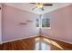 Bedroom features bright window and a ceiling fan at 21710 Silver Meadow Ln, Parker, CO 80138