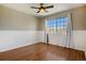 Bedroom features a bright window and neutral decor at 21710 Silver Meadow Ln, Parker, CO 80138
