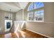 Bright hallway with hardwood floors and large windows that let in plenty of natural light at 21710 Silver Meadow Ln, Parker, CO 80138