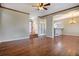 Open-concept living room with hardwood floors, and open views to other areas of the home at 21710 Silver Meadow Ln, Parker, CO 80138