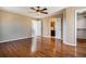 Spacious main bedroom with hardwood floors, walk-in closet and ensuite bathroom at 21710 Silver Meadow Ln, Parker, CO 80138