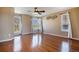 Spacious main bedroom featuring hardwood floors, large windows, and neutral decor at 21710 Silver Meadow Ln, Parker, CO 80138