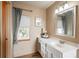 Clean bathroom with white vanity, and window with a view at 37677 Sable Ridge Rd, Elizabeth, CO 80107
