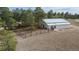 Charming single-Gathering home on a sprawling lot with a metal roof, a fenced in garden, and an outbuilding at 37677 Sable Ridge Rd, Elizabeth, CO 80107