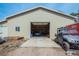 Spacious garage with high ceilings, a large door opening, and plenty of storage at 37677 Sable Ridge Rd, Elizabeth, CO 80107