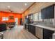 Stylish kitchen featuring stainless steel appliances, and an open layout connecting to the living area at 37677 Sable Ridge Rd, Elizabeth, CO 80107