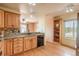 Charming kitchen featuring wood cabinets, granite counters and stainless steel appliances at 37677 Sable Ridge Rd, Elizabeth, CO 80107