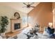 Bright and airy living room with a fireplace, lots of natural light, hardwood floors, and neutral paint at 37677 Sable Ridge Rd, Elizabeth, CO 80107