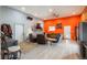 Open concept living area with lots of seating, hardwood floors and nice lighting at 37677 Sable Ridge Rd, Elizabeth, CO 80107