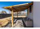 Cozy back patio with a covered pergola offers shade and relaxation at 6005 E Iowa Ave, Denver, CO 80224