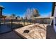 Large fenced backyard with gravel and patio area perfect for entertaining at 6005 E Iowa Ave, Denver, CO 80224