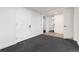 Basement area with two doorways leading to adjacent rooms at 6005 E Iowa Ave, Denver, CO 80224