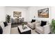 Stylish living room with modern decor and comfortable seating arrangement at 6005 E Iowa Ave, Denver, CO 80224