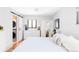 Bedroom features natural light, closet, and washer/dryer hookups at 1634 S King St, Denver, CO 80219