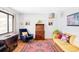 Bright living room featuring hardwood floors, stylish furnishings, and ample natural light at 1634 S King St, Denver, CO 80219