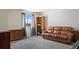Bedroom featuring neutral walls, plush carpet, and a window with a view of the outdoors at 7745 Grant St, Denver, CO 80229