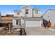 Charming two-story home featuring vinyl siding, a two-car garage, and well-maintained landscaping at 7745 Grant St, Denver, CO 80229