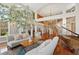 Spacious living room with vaulted ceilings and open concept floor plan at 2627 E Willamette Ln, Greenwood Village, CO 80121