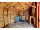 The shed interior featuring a workbench, pegboard, and an abundance of storage space at 184 Signal Rock Rd, Golden, CO 80403