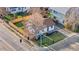 Aerial view of the home with a fenced yard, showcasing location at the corner of two roads at 3073 S Elati St, Englewood, CO 80110