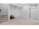 Unfinished basement offers versatile space for recreation, fitness, or additional storage at 6052 N Malta St, Aurora, CO 80019