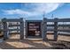 Entrance to the Indian Paintbrush Gardens in the community, surrounded by a fence at 6052 N Malta St, Aurora, CO 80019