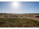 Scenic community park featuring expansive green spaces and walking paths on a sunny day at 6052 N Malta St, Aurora, CO 80019