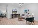 Cozy living room with comfortable seating, TV, and neutral decor for relaxing and entertaining at 6052 N Malta St, Aurora, CO 80019
