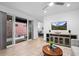 Bright living room showcases an open layout with sliding glass doors to the patio, offering indoor-outdoor living at 6052 N Malta St, Aurora, CO 80019