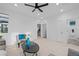 Bright loft with modern decor featuring a seating area and easy access to rooms at 6052 N Malta St, Aurora, CO 80019