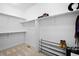 Spacious walk-in closet with ample shelving and storage space for organization at 6052 N Malta St, Aurora, CO 80019