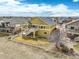 Two-story home showcasing a large deck, and landscaping for outdoor enjoyment at 15004 Verbena St, Thornton, CO 80602