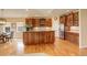 Charming kitchen with stainless steel appliances, wood cabinets and granite countertops at 15004 Verbena St, Thornton, CO 80602