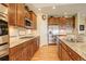 Updated kitchen with stainless steel appliances, granite countertops and plenty of cabinet space at 15004 Verbena St, Thornton, CO 80602