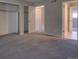 Spacious bedroom featuring ample closet space and multiple doorways for easy access to other areas at 1060 S Parker Rd # 9, Denver, CO 80231