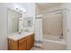 Well-maintained bathroom features a tub with shower, and vanity with ample counter space at 9907 Martin Luther King Blvd # 103, Denver, CO 80238