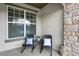 Charming patio space featuring comfortable seating and stylish decorative accents at 9907 Martin Luther King Blvd # 103, Denver, CO 80238