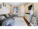 Comfortable living room featuring a gray sofa, console table, and modern decor at 21088 Randolph Pl, Denver, CO 80249