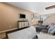 Open living room with hardwood floors, modern furniture, and plenty of natural light at 21088 Randolph Pl, Denver, CO 80249