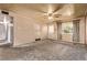 Bright living room featuring a large window that offers an abundance of natural light at 1000 Salem St, Aurora, CO 80011