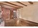 Living room featuring hardwood floors, fireplace and abundant natural light at 1000 Salem St, Aurora, CO 80011
