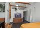 Cozy bedroom with loft, wooden ladder, a TV and modern decor at 10839 Carrol Ln, Northglenn, CO 80233