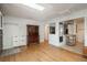Open living room with hardwood floors, natural lighting, and modern decor at 10839 Carrol Ln, Northglenn, CO 80233