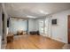 Open living room with hardwood floors, natural lighting, and modern decor at 10839 Carrol Ln, Northglenn, CO 80233