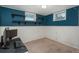Basement office area featuring a computer desk, shelving, and a window for natural light at 10839 Carrol Ln, Northglenn, CO 80233