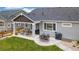 Outdoor space featuring a covered patio with furniture, perfect for entertaining guests at 16840 New Autumn Dr, Monument, CO 80132