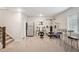Finished basement featuring home gym with equipment, bar, and wood-look flooring at 16840 New Autumn Dr, Monument, CO 80132