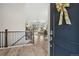 Inviting foyer with hardwood floors and a view of the living area with mountain view at 16840 New Autumn Dr, Monument, CO 80132