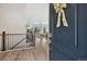 Inviting foyer with hardwood floors and a view of the living area with mountain view at 16840 New Autumn Dr, Monument, CO 80132