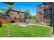 Lush backyard perfect for entertaining with plenty of outdoor seating and privacy fencing at 558 N Washington St # 305, Denver, CO 80203